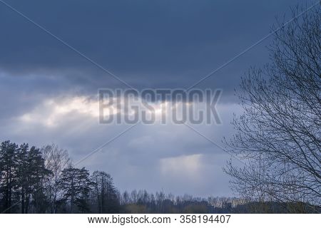 Rays Of Sunlight That Pass Through Gaps In The Clouds And Form Visible 
