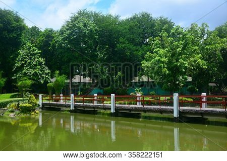 Manila, Ph - July 6: Bridge And Lake At Japanese Garden Inside Rizal Park On July 6, 2016 In Manila,