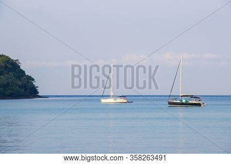 White And Black Sailboat Of Tourist At The Background The Blue Sky On The Ao Thai Sea Area Around Ha