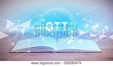 Open book with OTT abbreviation, modern technology concept