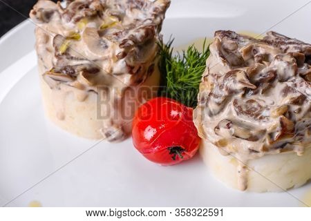 Delicious Beef Stroganoff With Soft Mashed Potatoes. Beef Stroganoff Served With Potato