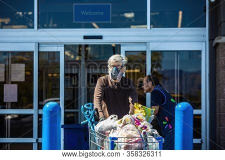 Tucson, United States  - March 29: Unidentified Man Wearing A Ventilator Mask Leaving A Retail Store