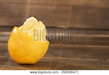 Spondias Purpurea - Delicious Tropical Fruit. Wood Background
