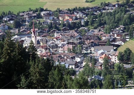Aerial View Of A Small Town In The Alps In Italy