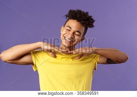 Close-up Portrait Of Carefree Handsome Young Man, Do Stretching Exercises At Home While On Quarantin