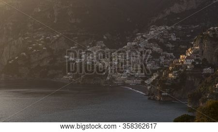 Positano Village On The Cliff Seen On Golden Hour In February When Hiking