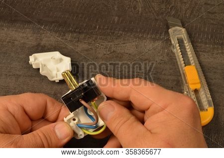 Assembly Of The Electrical Plug After Connecting To The Wire