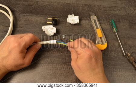 Wire Stripping For Mounting An Electrical Plug With Ground