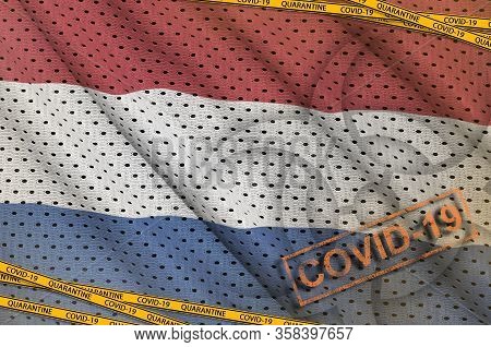 Netherlands Flag And Covid-19 Biohazard Symbol With Quarantine Orange Tape And Stamp. Coronavirus Or