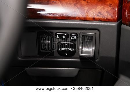 Novosibirsk, Russia - February 19, 2020  Toyota Alion,  Close-up Of The  Mirrror Setting Buttons. Mo