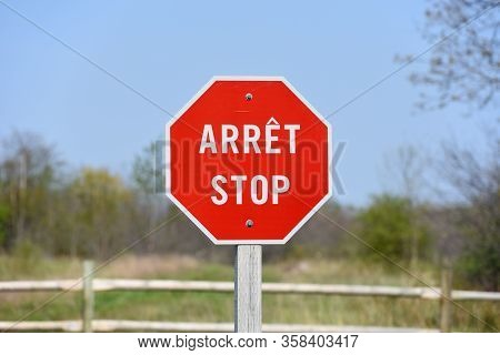 Bilingual Stop Sign With French Arret At The Top And English Stop At The Bottom In Grand Pre In Nova
