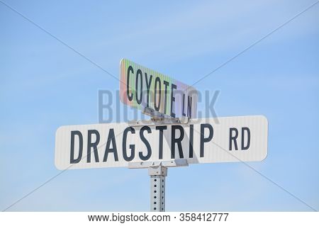Dragstrip Rd Sign And Coyote Ln Sign In Goodyear, Maricopa County, Arizona Usa