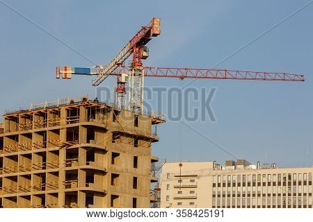 Tower Cranes Working On The Construction Of The Building