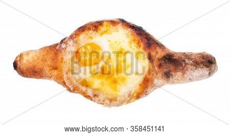 Georgian Cuisine - Top View Of Adjarian Boat-shaped Khachapuri With Cheese, Butter And Egg Yolk Isol