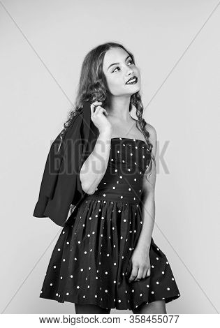Beauty Portrait. After Hairdresser Salon. Old Fashioned Child In Dress. Retro Fashion Model. Elegant