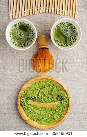 Matcha Tea Making Process, Wooden And Bamboo Kitchen Utensils, Metal Straws On Linen Beige Backgroun
