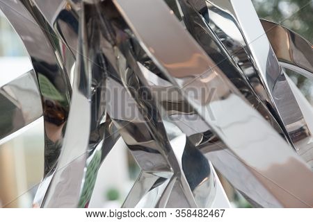 Abstract Figures Of Metal And Steel. Steel Shiny Structures Arbitrary Shape Reflection, Blank For De