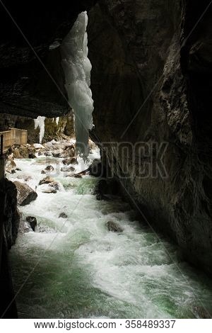 Snow-covered Icicles At Partnachklamm, Famous Tourist Destination. Partnachklamm In Garmisch-partenk