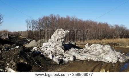 Dirty Snow On The Road. Springtime. Landscape.