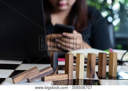 Growing Business Concept. Business Woman Picking Domino Blocks For Filling The Missing Dominus And P