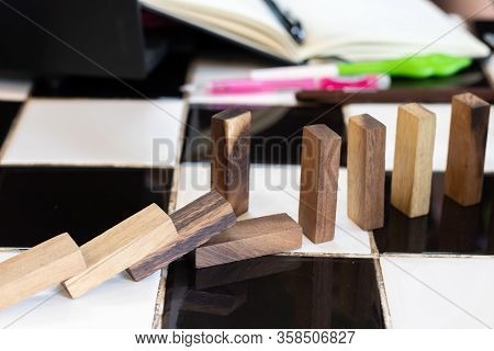 Growing Business Concept. Business Woman Picking Domino Blocks For Filling The Missing Dominus And P