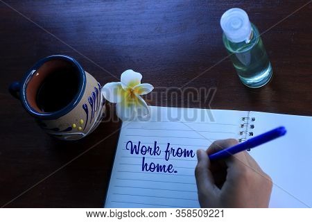 Work From Home. Keep Social Distancing. Message For Social Issues Concept With Hand Working Or Writi