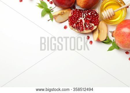 Apple, Honey And Pomegranate On White Background, Space For Text