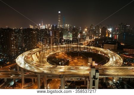Shanghai Nanpu Bridge over Huangpu River with busy traffic in China.