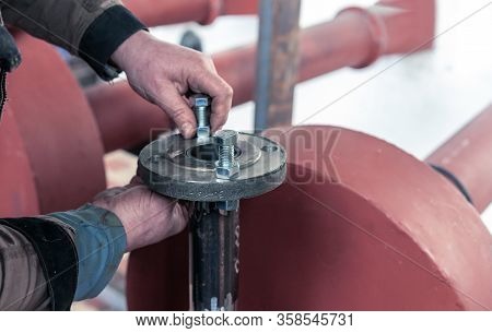 Fitter Assembler Is Assembling A New Gas Pipeline Line In A Gas Boiler Room.