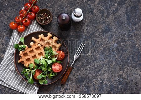 Cheese Waffles With Corn Salad And Tomans - Healthy Breakfast On A Concrete Background.