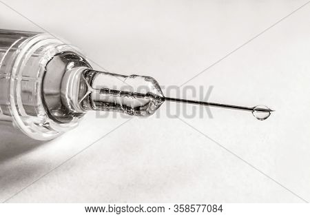 Vaccine And Syringe Injection. Medicine Coronavirus Cobid-19 Concept.