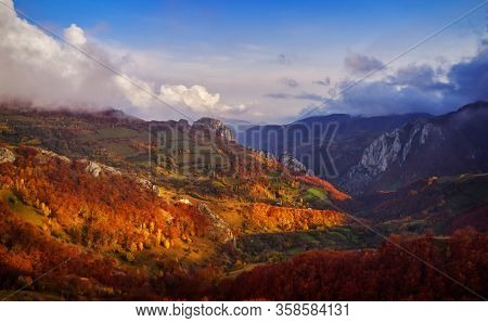 aerial view of Carpathian mountains countryside in autumn morning, Romania