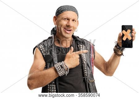 Punker pointing to a smartphone with a broken screen and adhesive bandage on the screen isolated on white background