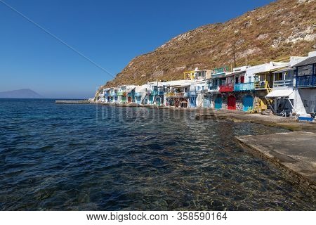 Coloured Houses In Klima Beach