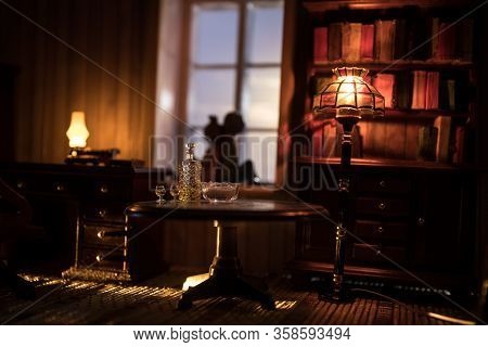 A Realistic Dollhouse Living Room With Furniture And Window At Night. Artwork Table Decoration With