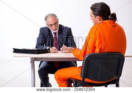 Young captive meeting with advocate in pre-trial detention