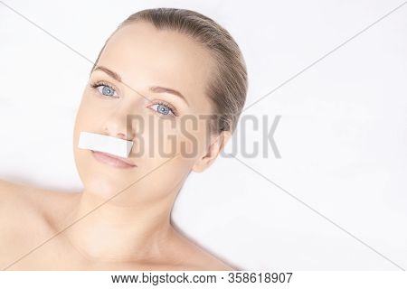 Girl Wax Lip At Depilation Center. Professional Remove Unwante Hair On Woman Face. Natural Wax Epila