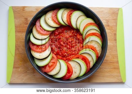Vegetables Prepared For Making Ratatouille On Wooden Cutting Board, Top View