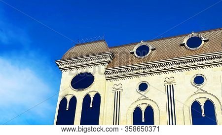 Tbilisi Architecture Against The Backdrop Of Cloudy Skies.