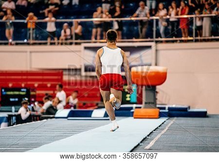 Gymnast Run Up Track Perform Gymnastics Vault Exercise
