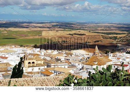 View Over The Town Rooftops With Wind Generators In The Distance, Medina Sidonia, Medina Sidonia, Ca