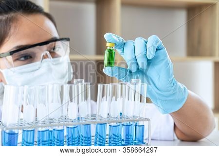 Scientist Or Medical In Lab Working In Biotechnological Laboratory Using Equipment For Research With
