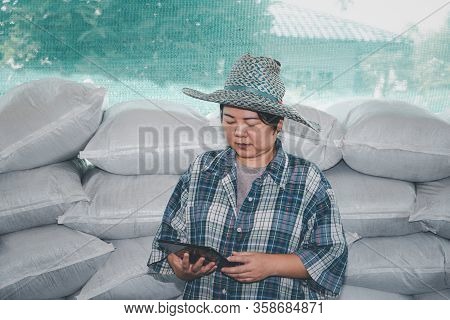 Smart Farmer Agriculturist With Organic Fertilizer