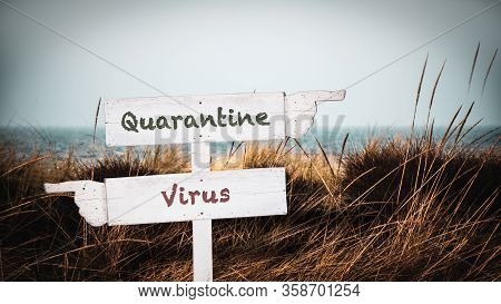 Street Sign To Quarantine Versus Virus
