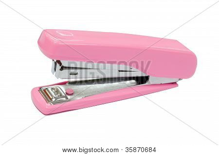 Pink stapler isolated on white