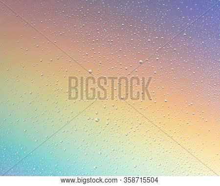 Water Drops On The Glass On A Bright, Colorful Background. Abstract, Soft Focus.