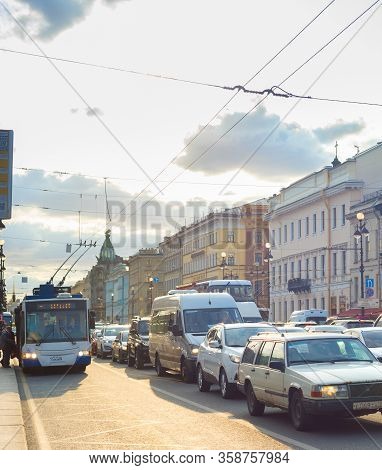 Saint Petersburg, Russia - July 11, 2019:  Cars In Traffic Jam On Nevskiy Avenue, Trolleybus Stop, C