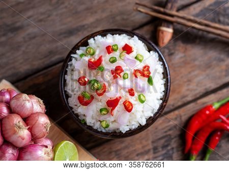Brow Rice Spicy Asian Food With Vegetable And Chopstic On Wooden Background