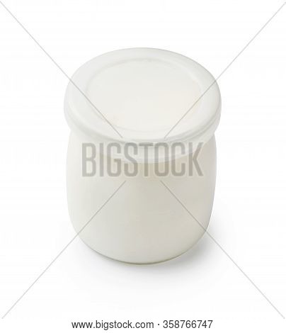 Fresh Natural Homemade Organic Yogurt With A Lid In A Glass Jar Isolated On White Background