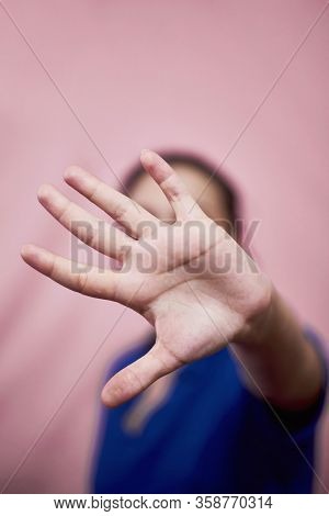 Stop Domestic Violence And Abuse Concept. Woman Saying Stop With Hands. Handgesture - Stop Violence 
